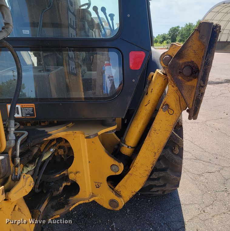 image for item JG9860 2000 John Deere 310SE  backhoe