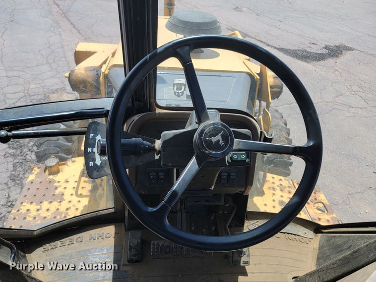 image for item JG9860 2000 John Deere 310SE  backhoe