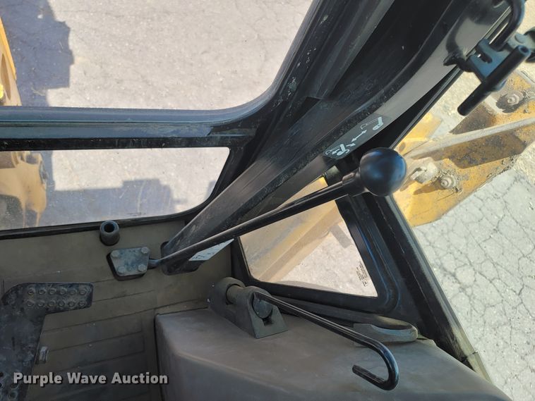 image for item JG9860 2000 John Deere 310SE  backhoe