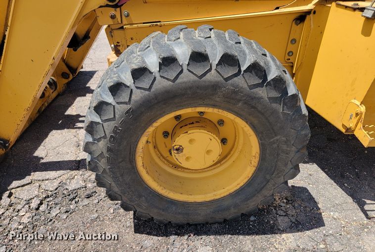 image for item JG9860 2000 John Deere 310SE  backhoe