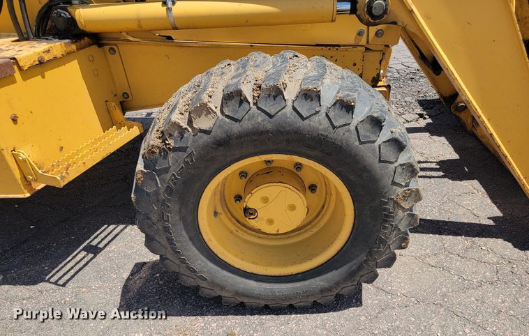 image for item JG9860 2000 John Deere 310SE  backhoe