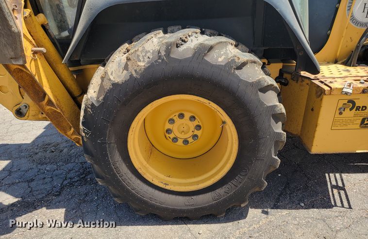 image for item JG9860 2000 John Deere 310SE  backhoe