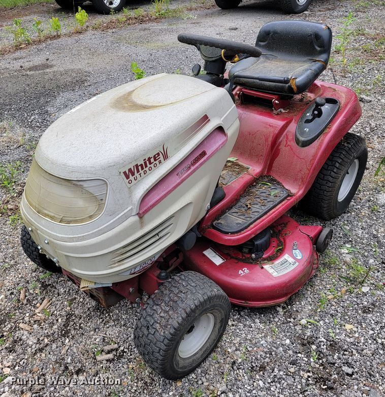 White LT1800 lawn mower in Branson, MO Item JL9374 sold Purple Wave