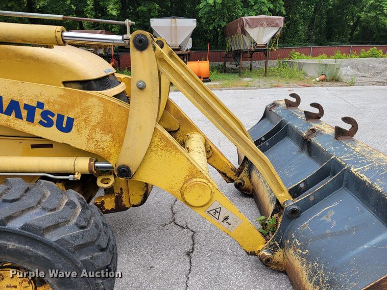 image for item JL9377 Komatsu WB150  backhoe