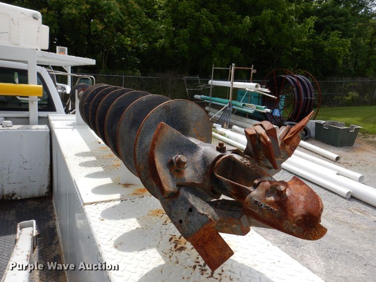 image for item KR9297 1998 Chevrolet C7500  digger derrick truck