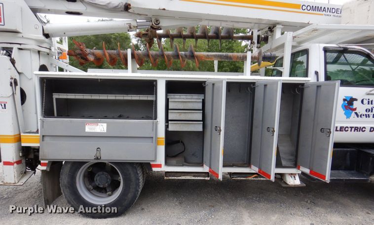 image for item KR9297 1998 Chevrolet C7500  digger derrick truck