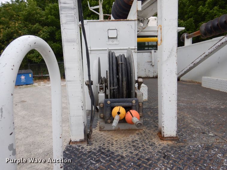 image for item KR9297 1998 Chevrolet C7500  digger derrick truck