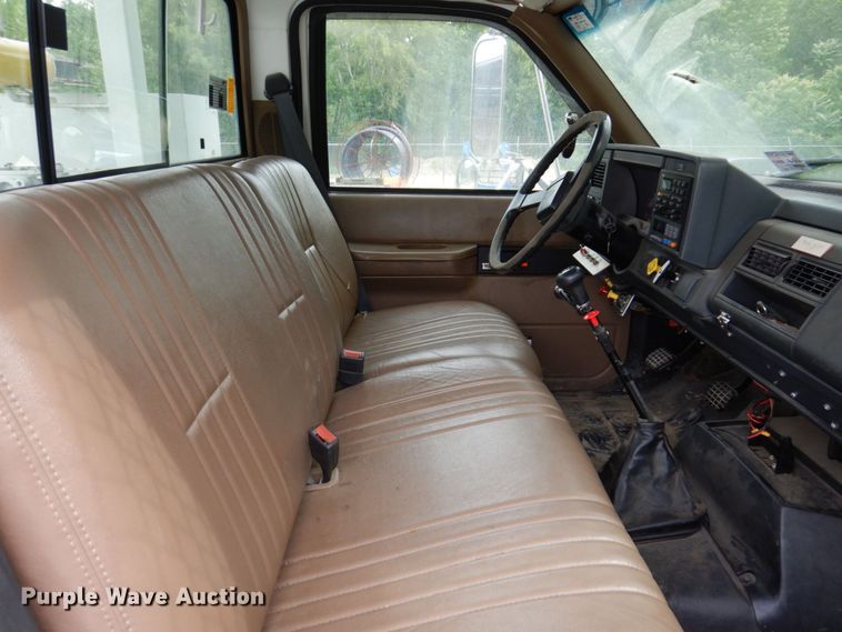 image for item KR9297 1998 Chevrolet C7500  digger derrick truck