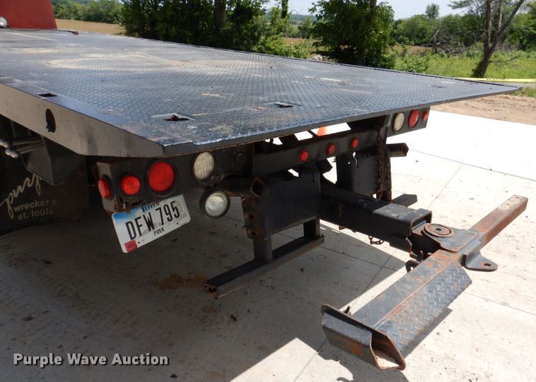 image for item JH9717 2003 International 4300  rollback truck