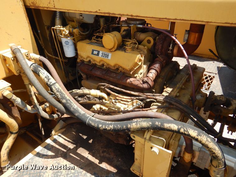 image for item DN0344 1986 Caterpillar TR-225B  asphalt trimmer