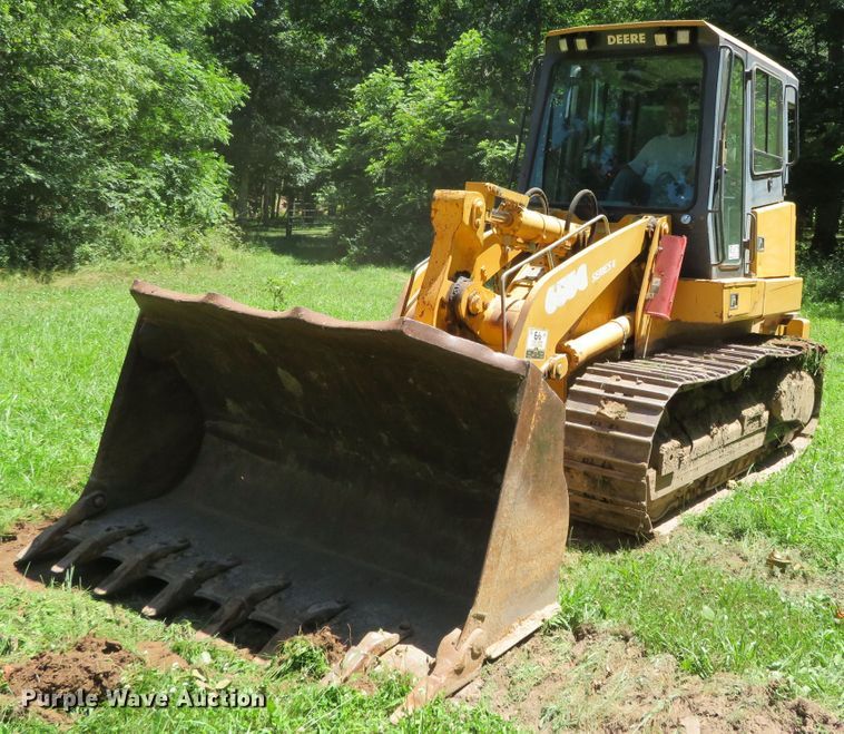 image for item DN7990 2004 John Deere 655C  track loader