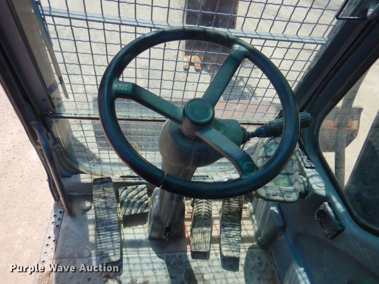 image for item DP4259 2004 Volvo EW180B  wheeled excavator