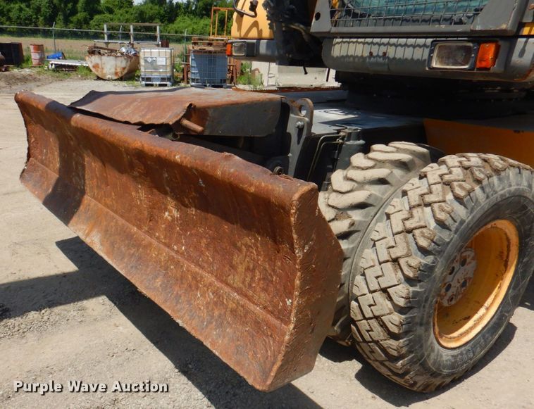 image for item DP4259 2004 Volvo EW180B  wheeled excavator