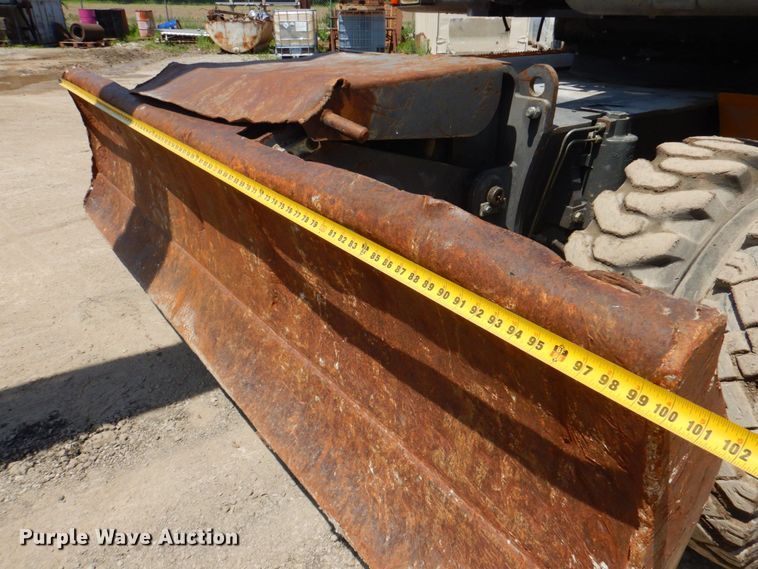 image for item DP4259 2004 Volvo EW180B  wheeled excavator