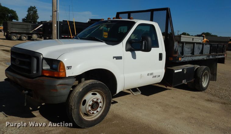 image for item MD9188 1999 Ford F550 Super Duty  dump flatbed truck