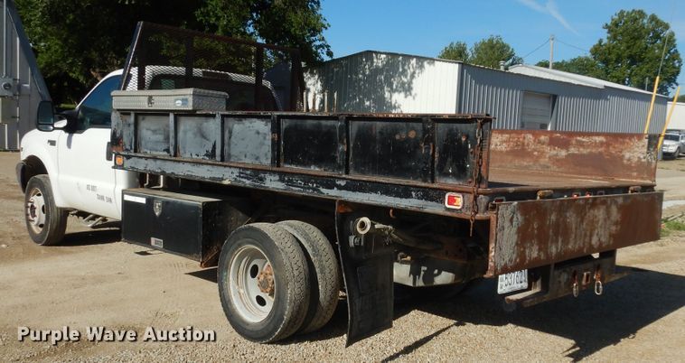 image for item MD9188 1999 Ford F550 Super Duty  dump flatbed truck