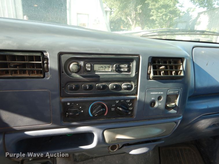 image for item MD9188 1999 Ford F550 Super Duty  dump flatbed truck