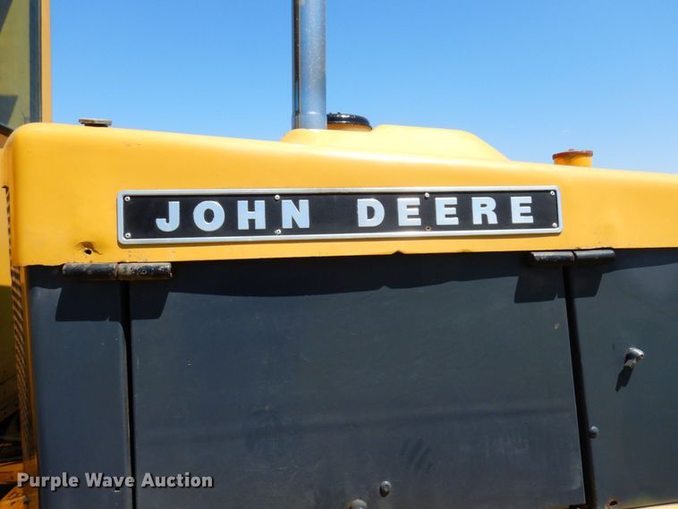 image for item MF9618 1981 John Deere 570A  rigid frame motor grader