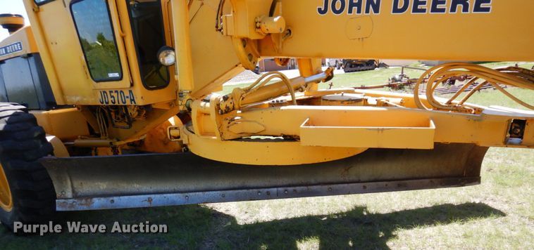 image for item MF9618 1981 John Deere 570A  rigid frame motor grader