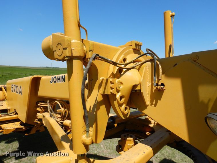 image for item MF9618 1981 John Deere 570A  rigid frame motor grader
