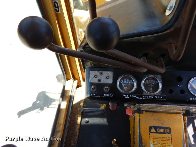 image for item MF9618 1981 John Deere 570A  rigid frame motor grader