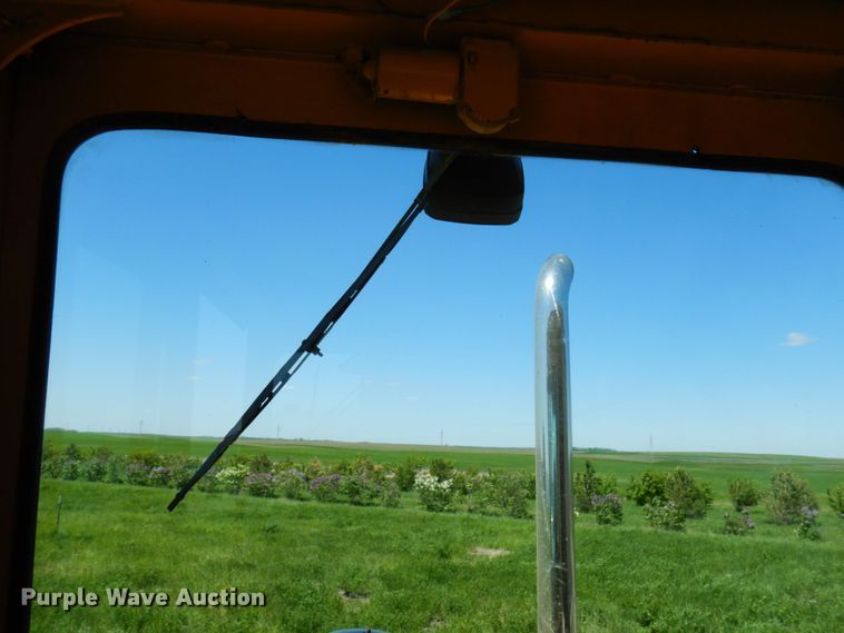 image for item MF9618 1981 John Deere 570A  rigid frame motor grader