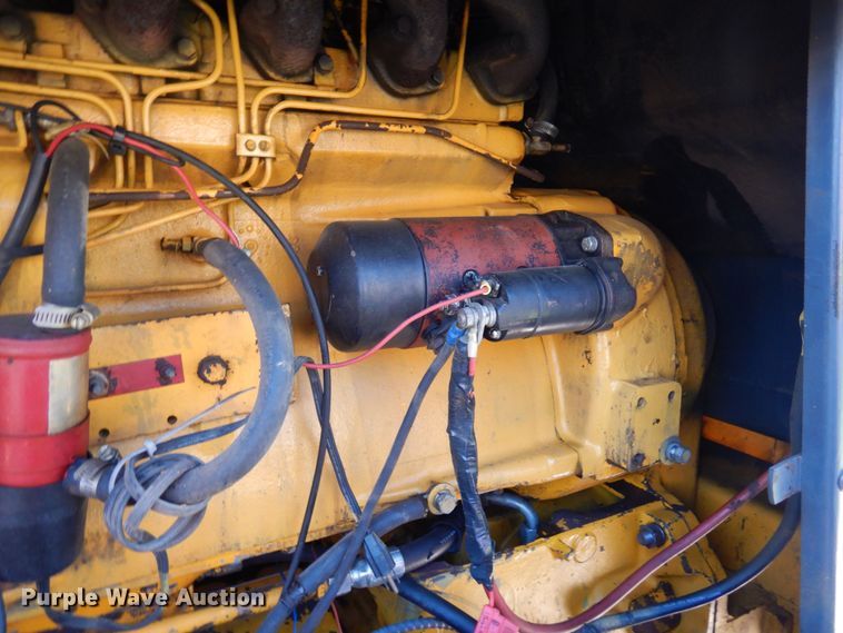 image for item MF9618 1981 John Deere 570A  rigid frame motor grader