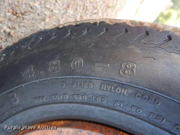 image for item LP9405 New Holland 848  round baler