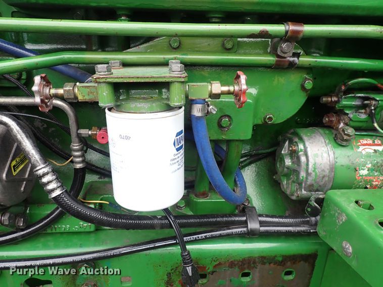 image for item DS7166 1988 John Deere 4450  MFWD tractor