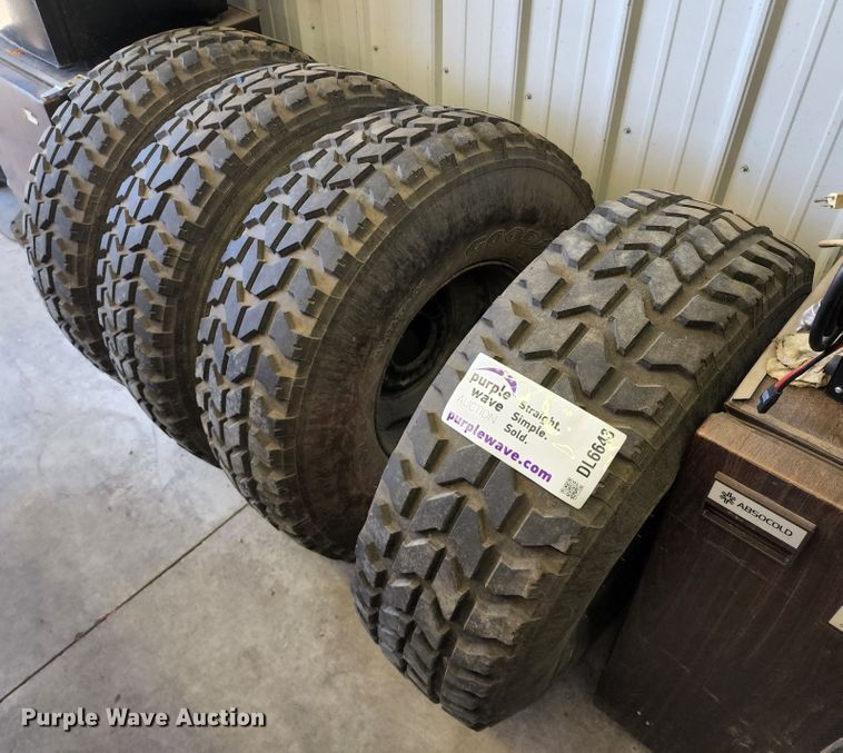image for item DL6643 (4) Goodyear Wrangler tires and wheels