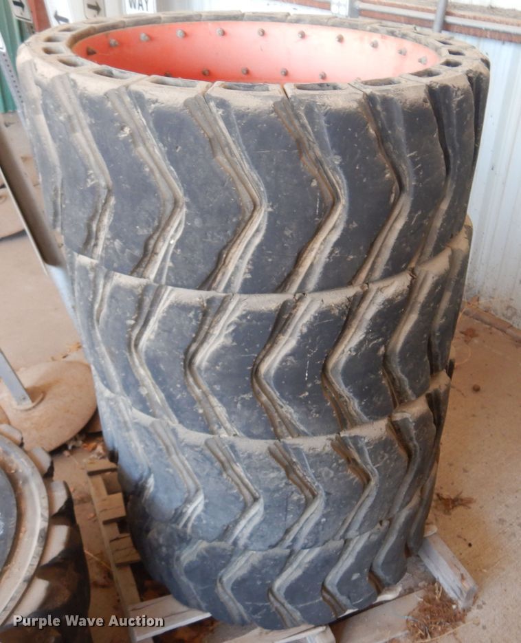 image for item DN0388 (4) soild skid steer tires and wheels