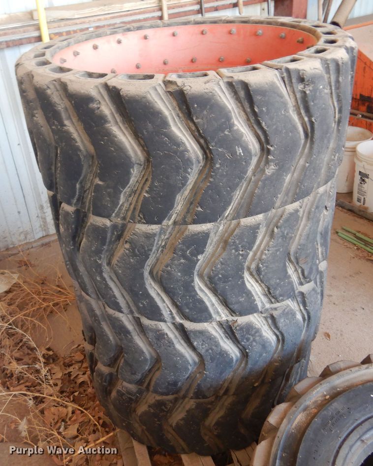 image for item DN0388 (4) soild skid steer tires and wheels