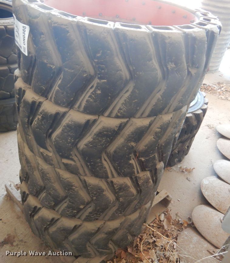 image for item DN0388 (4) soild skid steer tires and wheels