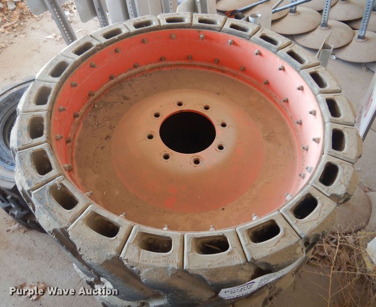 image for item DN0388 (4) soild skid steer tires and wheels