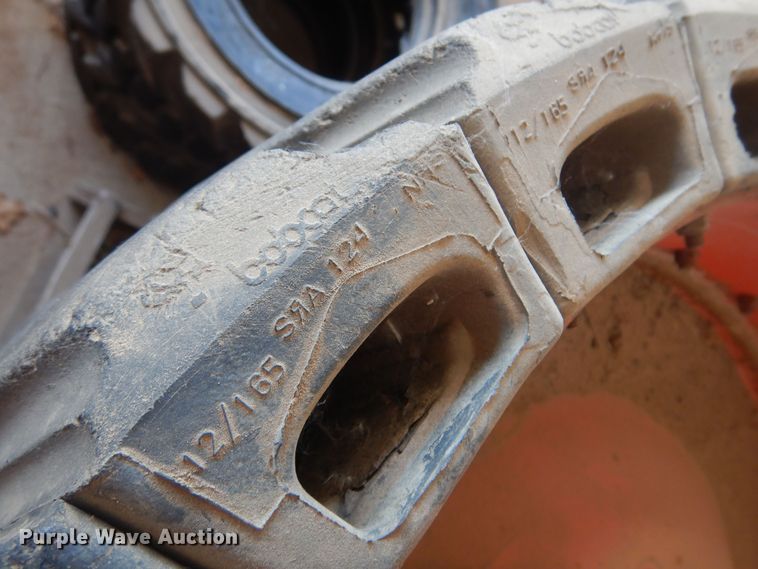 image for item DN0388 (4) soild skid steer tires and wheels