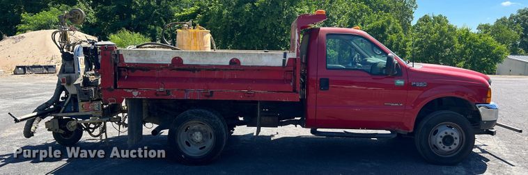 image for item KC9857 1999 Ford F550 XL  dump flatbed truck with paint striper