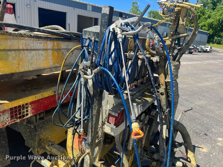 image for item KC9857 1999 Ford F550 XL  dump flatbed truck with paint striper