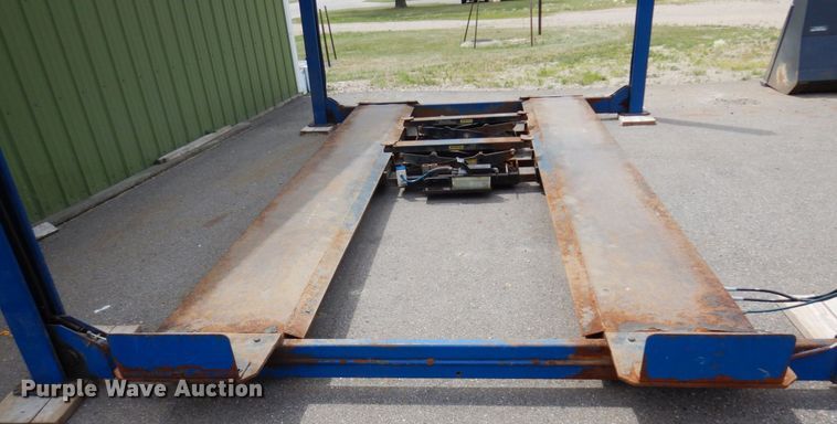 image for item MF9672 2004 Bend Pak HD-12SS  four post automotive lift