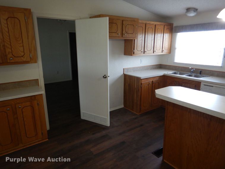 image for item KP9143 2009 Elliott Homes SW-R318  manufactured home