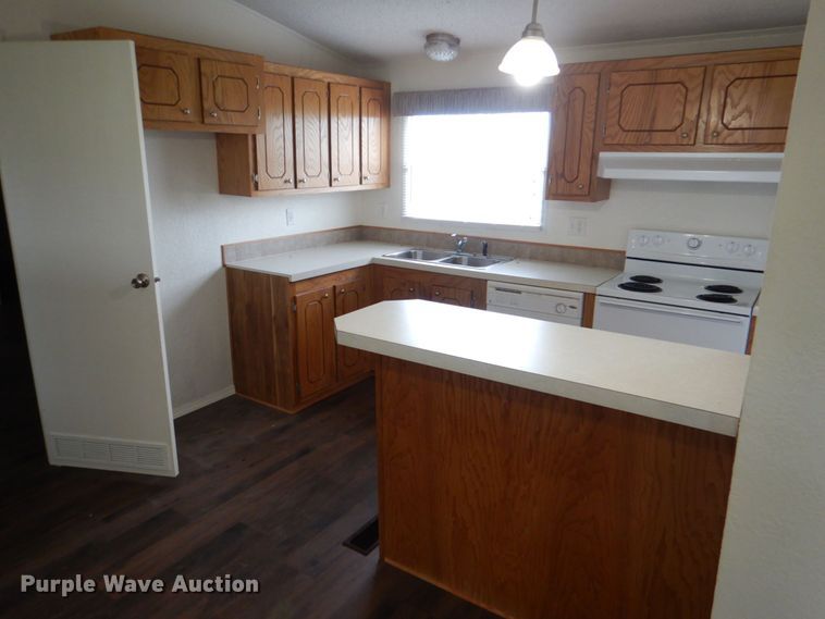 image for item KP9143 2009 Elliott Homes SW-R318  manufactured home