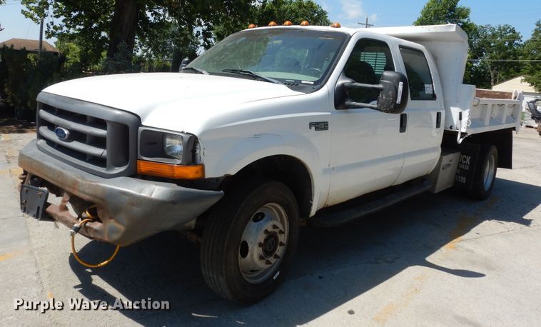 image for item MD9242 1999 Ford F450 Super Duty  dump flatbed truck