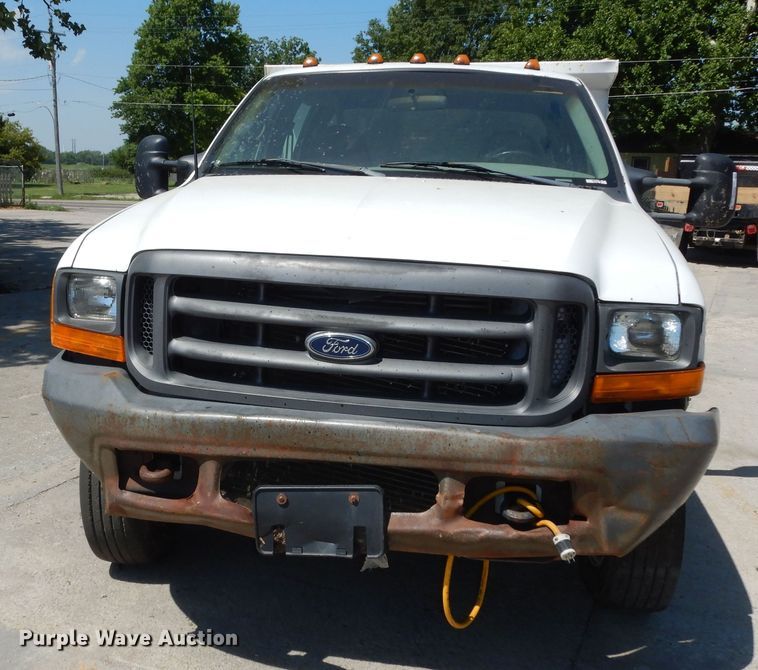 image for item MD9242 1999 Ford F450 Super Duty  dump flatbed truck