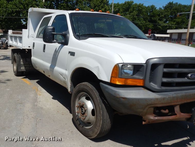 image for item MD9242 1999 Ford F450 Super Duty  dump flatbed truck