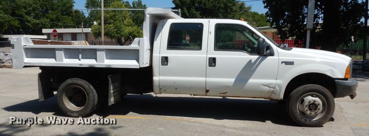 image for item MD9242 1999 Ford F450 Super Duty  dump flatbed truck