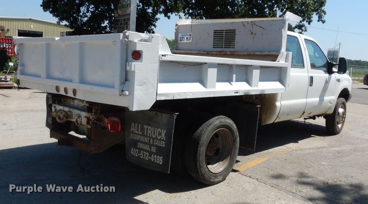 image for item MD9242 1999 Ford F450 Super Duty  dump flatbed truck
