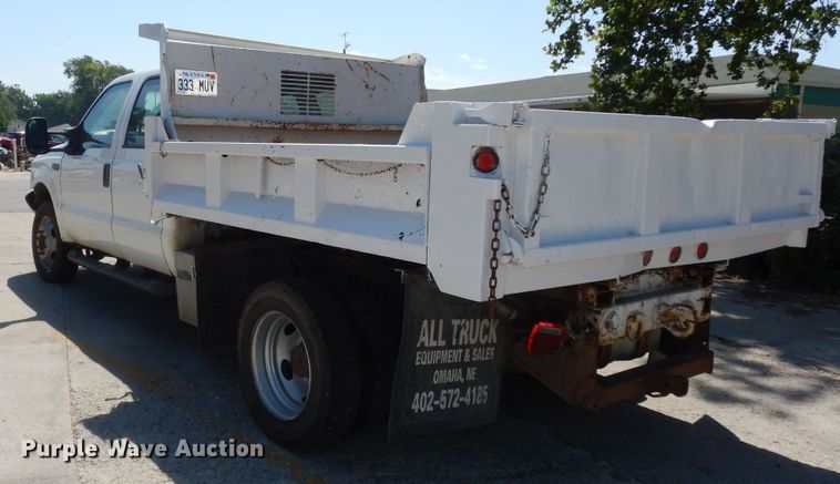 image for item MD9242 1999 Ford F450 Super Duty  dump flatbed truck