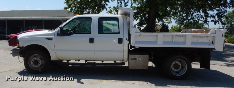 image for item MD9242 1999 Ford F450 Super Duty  dump flatbed truck