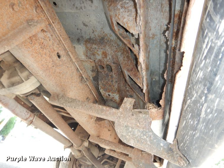 image for item MD9242 1999 Ford F450 Super Duty  dump flatbed truck