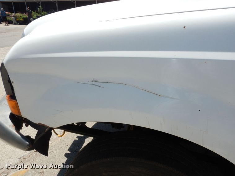 image for item MD9242 1999 Ford F450 Super Duty  dump flatbed truck