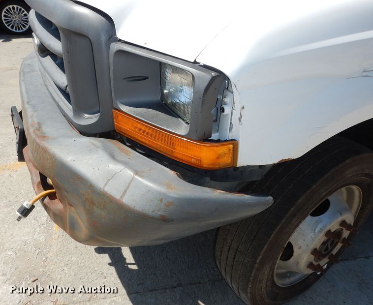 image for item MD9242 1999 Ford F450 Super Duty  dump flatbed truck